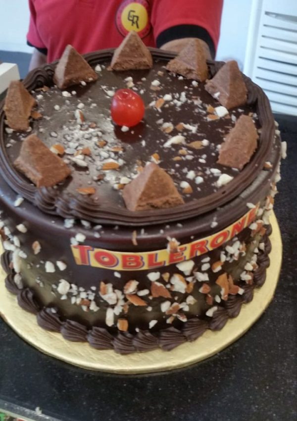 TOBLERONE CHOCOLATE CAKE BY THE BAKERS INN SIALKOT