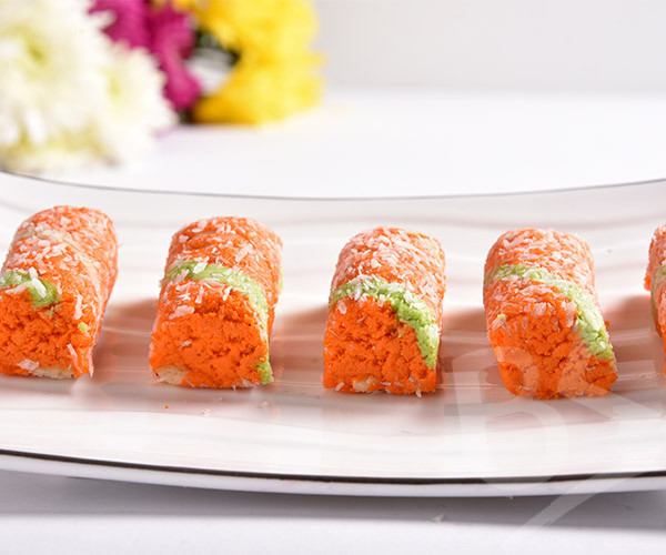 1 KG ORANGE ROLL - BUNDU KHAN SWEETS